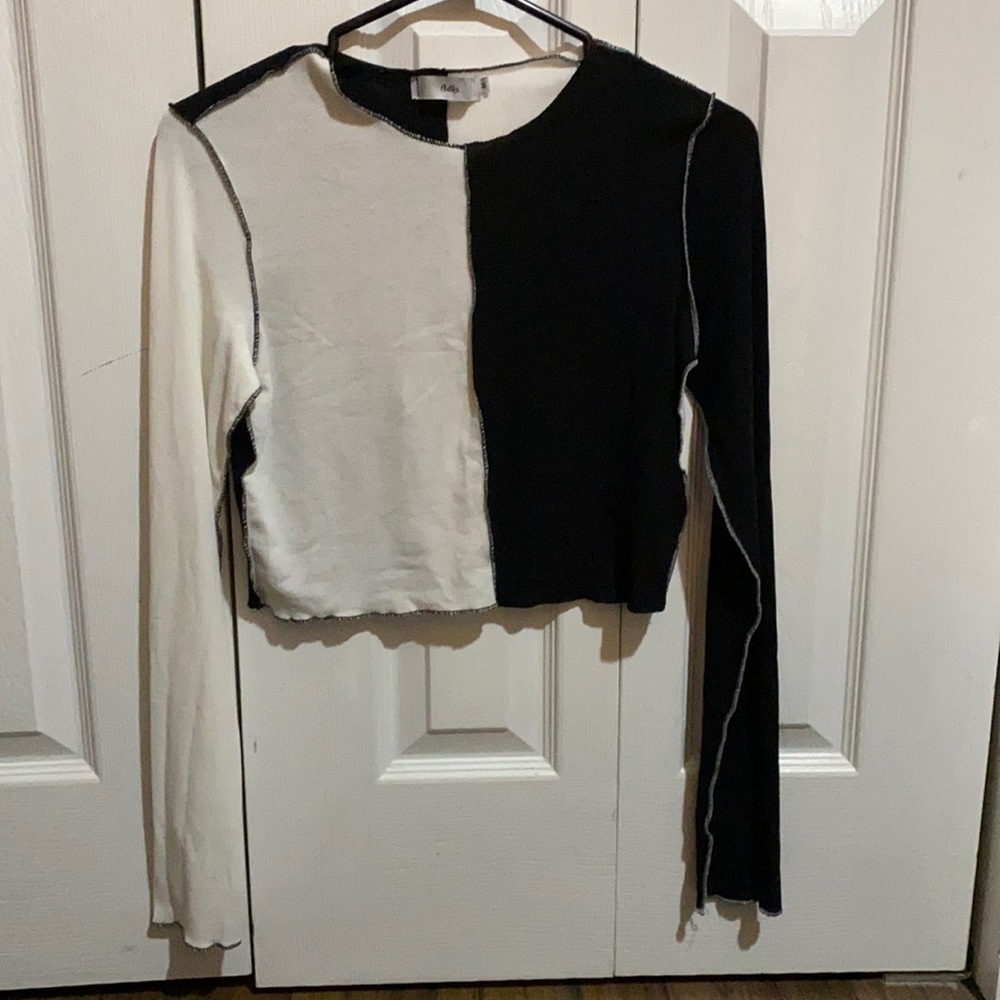Half black half white long sleeve top.